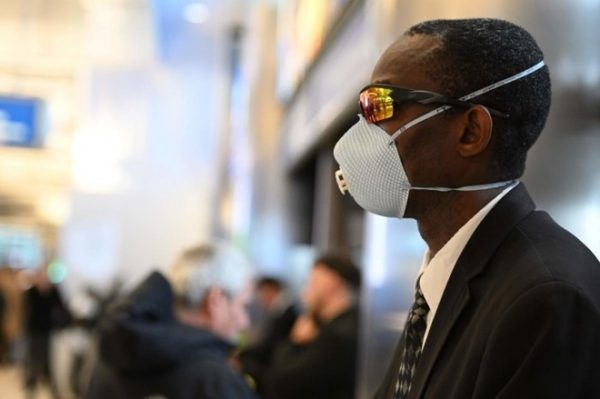 Black man in N95 mask