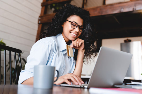 Black woman making online payment