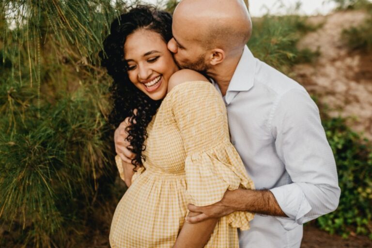 pregnant couple outside