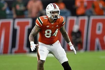 Cam McCormick on football field.