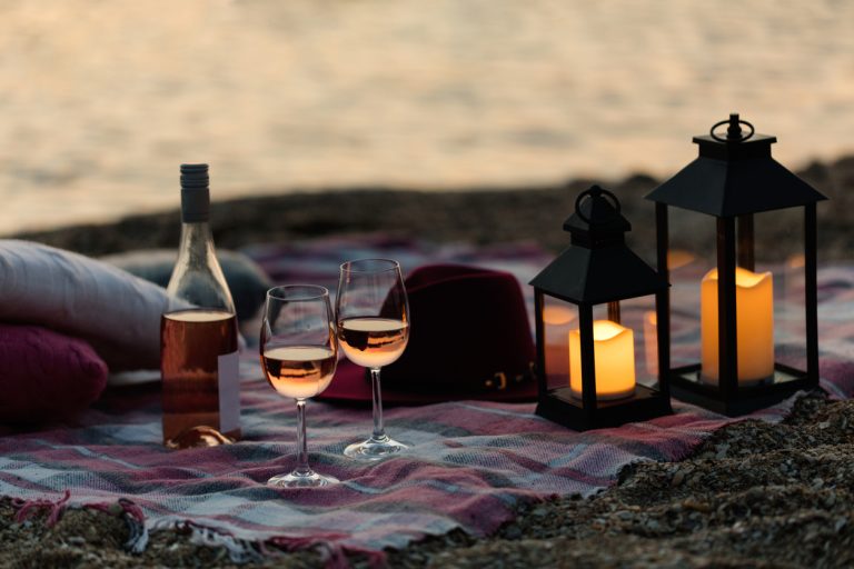 Last-minute date ideas-wine, lantern, plaid picnic blanket