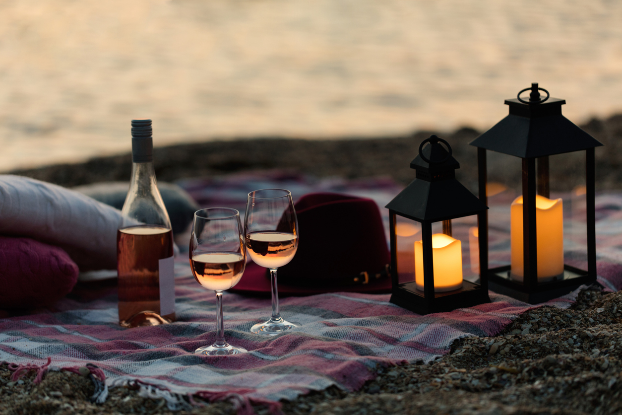 Last-minute date ideas-wine, lantern, plaid picnic blanket