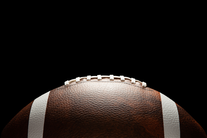 football to represent Cam McCormick