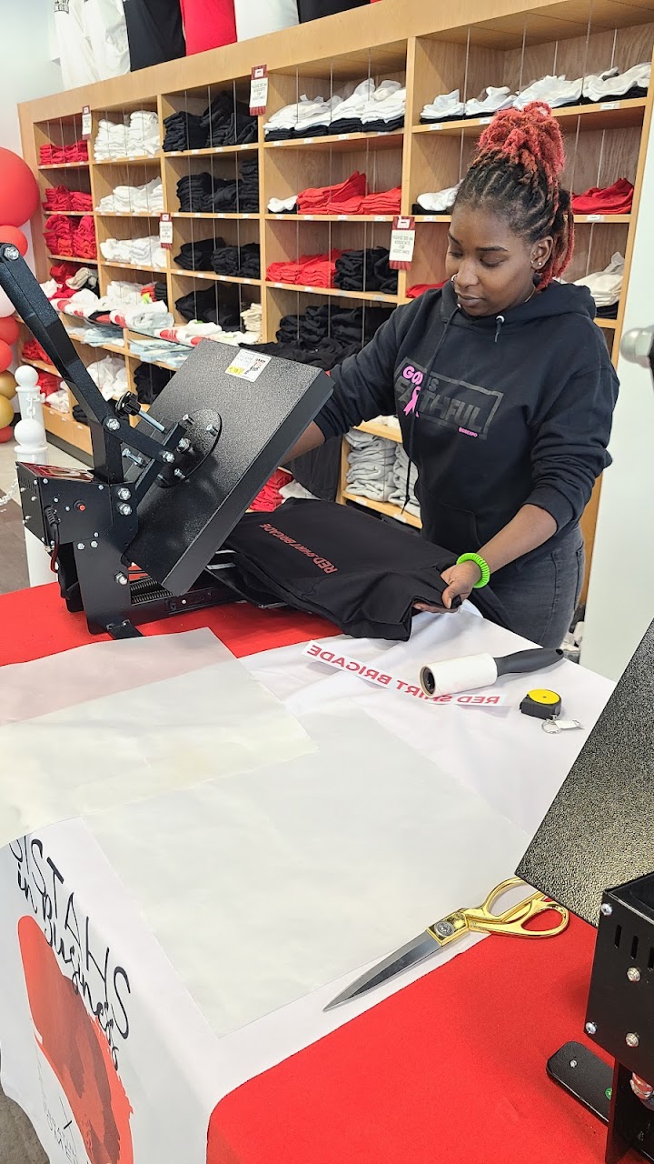 Black-owned t-shirt printer working