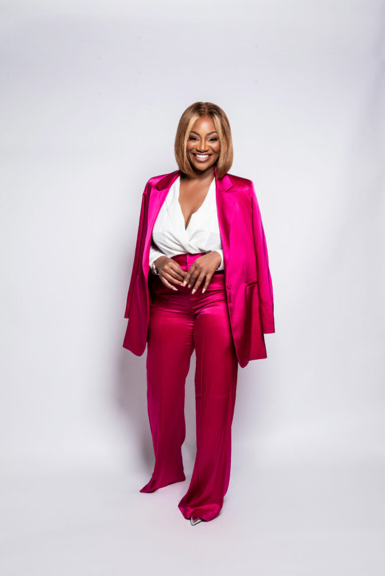 LaToya Shambo in red pantsuit.