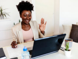 Black woman in virtual interview.