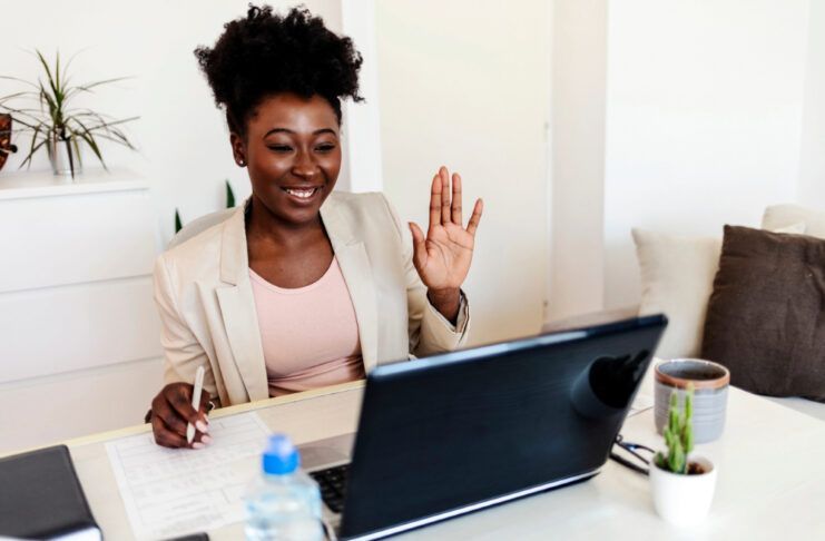 Black woman in virtual interview.