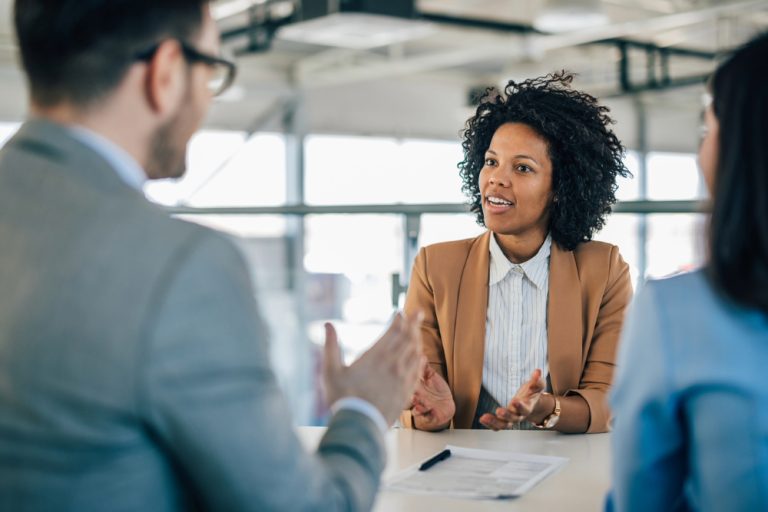 Black woman avoiding red flags in job interview