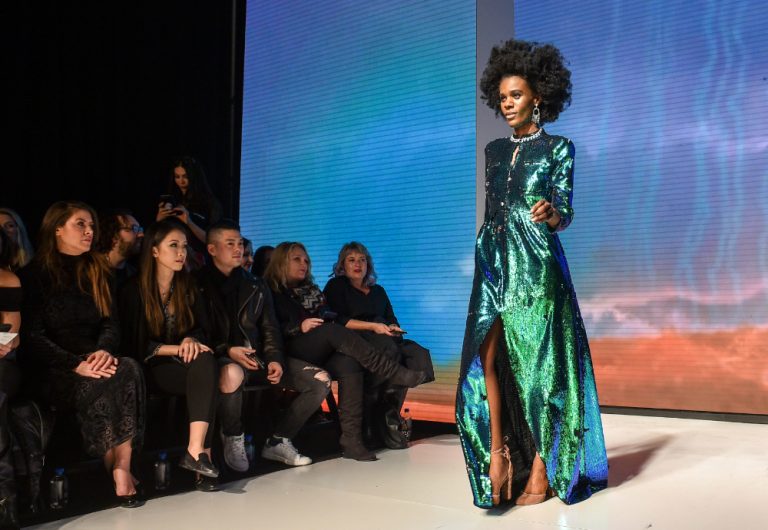 Nini Amerlise walking the runway by faith