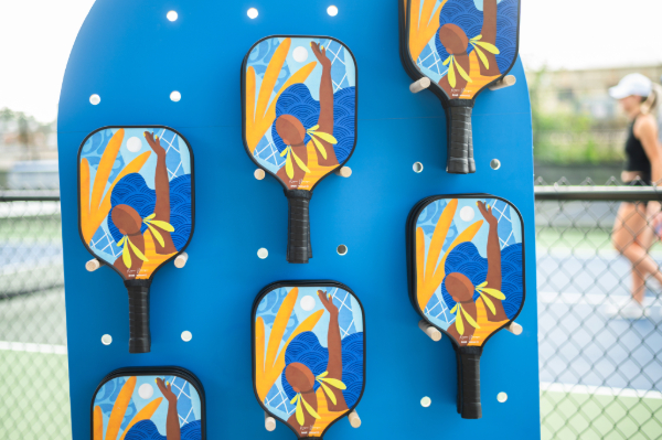 Pickleball rackets designed by Reyna Noriega from Wal-Mart Aces event, brining joy.