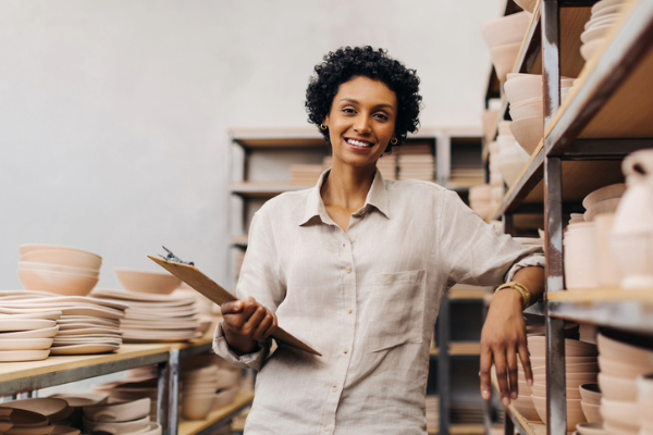 Black,crafter businesswoman in her warehouse as she scales her business.