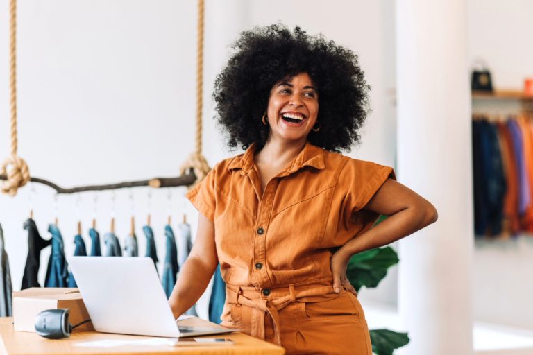 Black businesswoman flourishing and thriving.