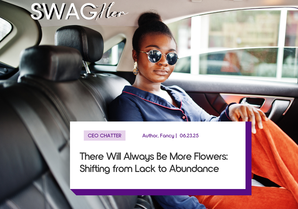 Black woman in a luxury car with an abundance mindset.