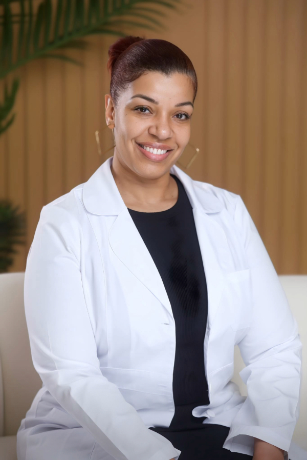 Ree's Bar of Beauty Owner Sherrie Rey 2 in white coat