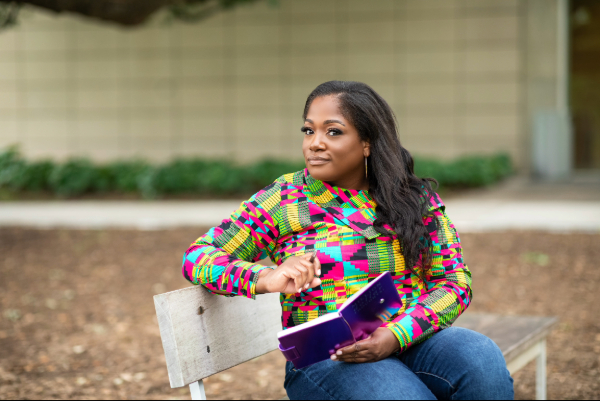 Angela Bates of The Write CEO in the park writing