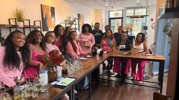 50 Shades of Pink DC Bus Tour Celebrates Black Women-Owned Businesses Across the DMV- Group photo at Wittington Candle Co.